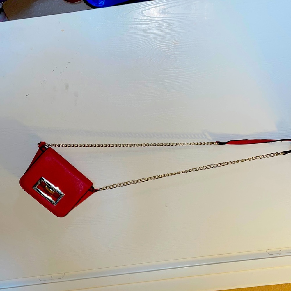red and gold purse